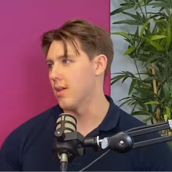 Governa Connect podcast guest speaking into a microphone.