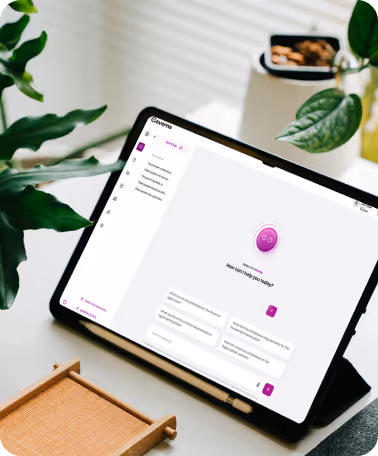 Tablet showing conversational AI interface on office desk.